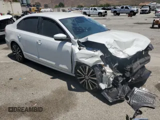 2014 Volkswagen Jetta SE with VIN 3VWD17AJ5EM295208, listed as a Copart auction lot 64684005 with 94,133 mi miles and Salvage title. Bid and sale history available at DreamBid. Image 4.