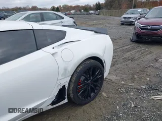 2014 Chevrolet Corvette 1LT z VIN 1G1YA2D7XE5128719, wystawiony jako IAAI lot #40877448 z przebiegiem 75 961 mil mil oraz . Historia ofert i sprzedaży dostępna na DreamBid. Obrazek 6.