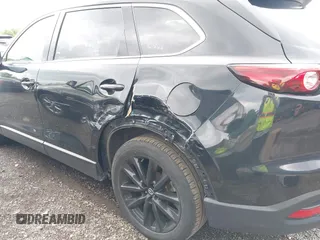 2023 Mazda CX-9 Touring Plus with VIN JM3TCBAY2P0657825, listed as a IAAI auction lot 42756562 with 52,090 mi miles and . Bid and sale history available at DreamBid. Image 6.