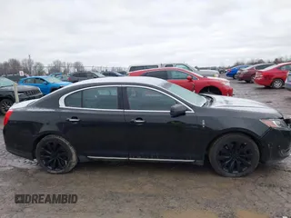 2014 Lincoln MKS with VIN 1LNHL9EK3EG601471, listed as a IAAI auction lot 41142126 with 110,432 mi miles. Bid and sale history available at carsss.com. Image 14.