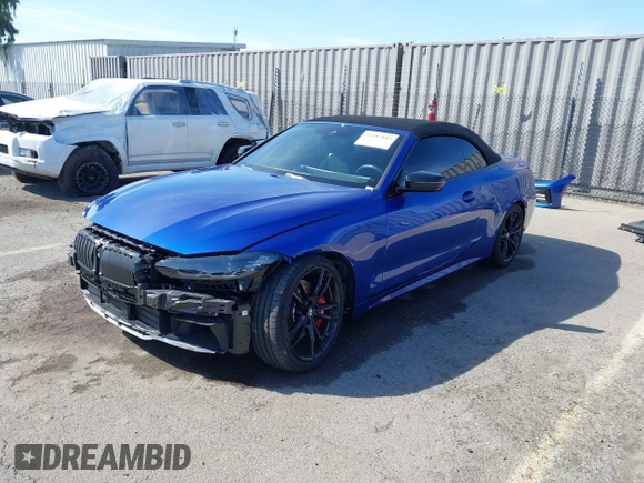 2024 BMW 4 Series M440i with VIN WBA53AT0XRCP39898, listed as a IAAI auction lot 41583884 with 2,212 mi miles and . Bid and sale history available at carsss.com. Image 2.