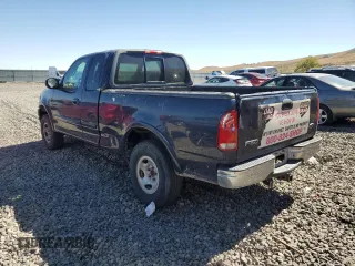 2000 Ford F-150 XL with VIN 1FTRX18L7YKA42575, listed as a Copart auction lot 73034804 with 263,959 mi miles and Non repairable. Bid and sale history available at DreamBid. Image 2.