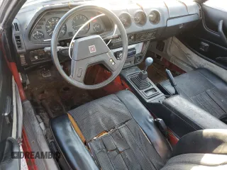 1983 Datsun 280ZX z VIN JN1HZ04S0DX569855, wystawiony jako Copart lot #74027594 z przebiegiem 12 300 mil mil oraz Szkody całkowita. Historia ofert i sprzedaży dostępna na DreamBid. Obrazek 8.