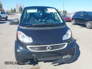 2014 Smart fortwo Pure with VIN WMEEJ3BA0EK740736, listed as a IAAI auction lot 41446173 with 68,530 mi miles and . Bid and sale history available at DreamBid. Image 11.
