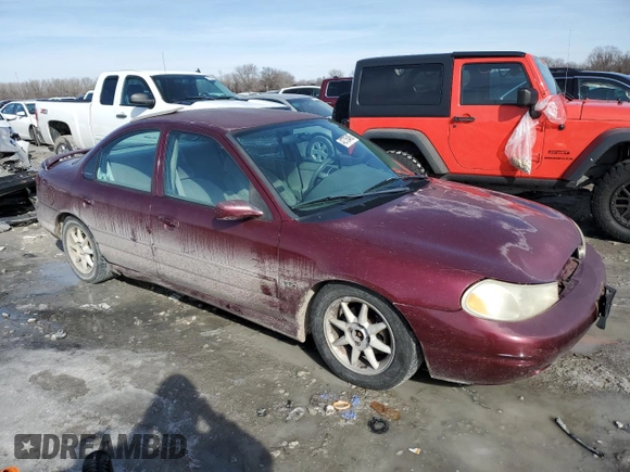 1998 Ford Contour LX with VIN 1FAFP66L4WK261970, listed as a Copart auction lot 42735485 with 106,450 mi miles and Salvage title. Bid and sale history available at DreamBid. Image 4.