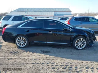 2015 Cadillac XTS Luxury with VIN 2G61N5S34F9226182, listed as a IAAI auction lot 41554394 with 119,194 mi miles. Bid and sale history available at carsss.com. Image 12.