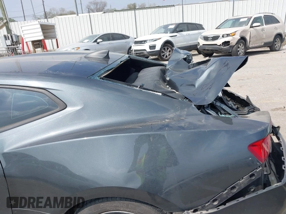2017 Chevrolet Camaro 1LT with VIN 1G1FB1RS0H0165579, listed as a IAAI auction lot 41796293 with 84,929 mi miles and . Bid and sale history available at DreamBid. Image 6.