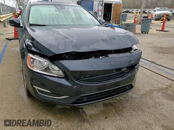 2016 Volvo S60 T5 Drive-E Premier z VIN YV126MFK5G2412365, wystawiony jako Copart lot #51577155 z przebiegiem 59 319 mil mil oraz Szkoda całkowita • Salvage title. Historia ofert i sprzedaży dostępna na DreamBid. Obrazek 13.