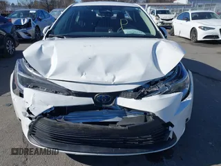 2024 Toyota Corolla Hybrid LE с VIN JTDBCMFE8R3039487, выставлен на аукционе IAAI как лот 41395567 с пробегом 16 915 миль миль и . История ставок и продаж доступна на DreamBid. Изображение 6.