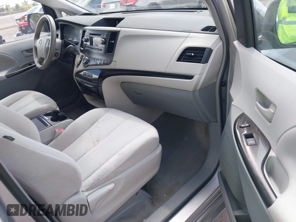 2013 Toyota Sienna LE AAS with VIN 5TDKK3DC4DS399295, listed as a IAAI auction lot 42173970 with 128,350 mi miles and . Bid and sale history available at DreamBid. Image 5.
