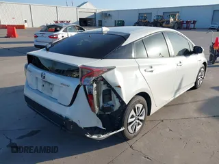2017 Toyota Prius Two with VIN JTDKARFU4H3535752, listed as a IAAI auction lot 41975718 with 304,314 mi miles. Bid and sale history available at carsss.com. Image 4.