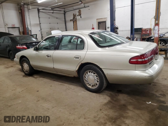 1997 Lincoln Continental with VIN 1LNLM97V3VY701840, listed as a Copart auction lot 84495824 with 166,022 mi miles and Clean Title. Bid and sale history available at carsss.com. Image 2.