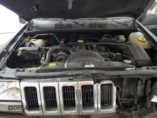 1996 Jeep Grand Cherokee Laredo with VIN 1J4GZ58S0TC402024, listed as a Copart auction lot 65074774 with 163,477 mi miles and Salvage Title. Bid and sale history available at carsss.com. Image 12.