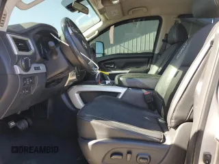2017 Nissan Titan XD SV with VIN 1N6BA1F4XHN521471, listed as a Copart auction lot 76291024 with 100,447 mi miles and Salvage Title. Bid and sale history available at carsss.com. Image 7.