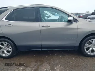 2019 Chevrolet Equinox Premier z VIN 3GNAXNEVXKS503474, wystawiony jako IAAI lot #42084263 z przebiegiem 93 838 mil mil oraz . Historia ofert i sprzedaży dostępna na DreamBid. Obrazek 14.