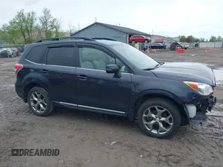 2016 Subaru Forester Touring z VIN JF2SJAXC4GH536118, wystawiony jako IAAI lot #42208701 z przebiegiem 117 227 mil mil oraz . Historia ofert i sprzedaży dostępna na DreamBid. Obrazek 13.