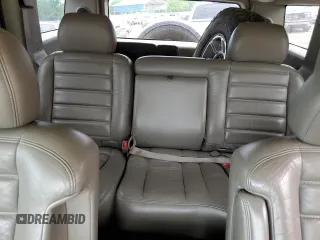 2003 Hummer H2 z VIN 5GRGN23U73H146894, wystawiony jako Copart lot #53449905 z przebiegiem 153 870 mil mil oraz Szkoda całkowita • Salvage title. Historia ofert i sprzedaży dostępna na DreamBid. Obrazek 10.