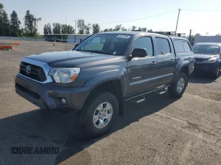 2014 Toyota Tacoma with VIN 3TMLU4EN5EM134391, listed as a Copart auction lot 62327555 with 104,492 mi miles and Salvage title. Bid and sale history available at DreamBid. Image 1.