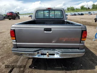 1997 Mazda B-Series Truck z VIN 4F4CR12A1VTM08969, wystawiony jako Copart lot #58539955 z przebiegiem 190 591 mil mil oraz Tytuł czysty. Historia ofert i sprzedaży dostępna na DreamBid. Obrazek 6.
