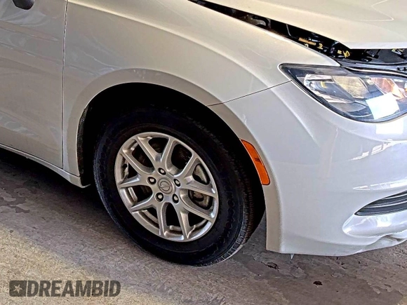 2017 Chrysler Pacifica Touring with VIN 2C4RC1DG5HR764942, listed as a IAAI auction lot 42255421 with 64,381 mi miles and . Bid and sale history available at DreamBid. Image 24.