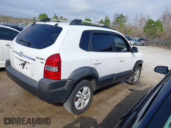 2007 Hyundai Tucson SE with VIN KM8JN12D77U638627, listed as a IAAI auction lot 41551224 with 156,125 mi miles. Bid and sale history available at carsss.com. Image 4.