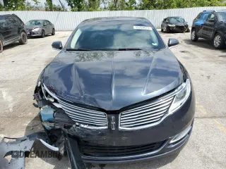 2014 Lincoln MKZ z VIN 3LN6L2G97ER822718, wystawiony jako Copart lot #55264075 z przebiegiem 141 738 mil mil oraz Szkoda całkowita • Salvage title. Historia ofert i sprzedaży dostępna na DreamBid. Obrazek 5.