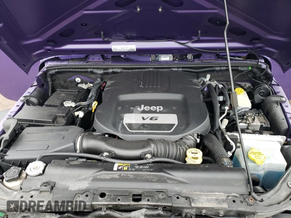 2017 Jeep Wrangler Willys Wheeler with VIN 1C4AJWAG0HL641188, listed as a Copart auction lot 52814005 with 94,959 mi miles and Salvage Title. Bid and sale history available at DreamBid. Image 11.