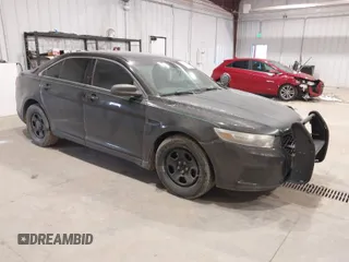 2014 Ford Sedan Police Interceptor with VIN 1FAHP2MT0EG103194, listed as a IAAI auction lot 41831070 with 186,466 mi miles. Bid and sale history available at carsss.com. Image 1.