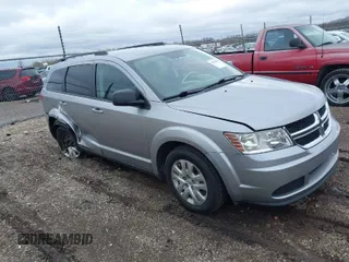 2016 Dodge Journey SE with VIN 3C4PDCAB4GT230643, listed as a IAAI auction lot 39127555 with 102,756 mi miles. Bid and sale history available at carsss.com. Image 1.
