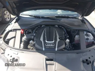 2016 Audi A8 L 4.0T Sport with VIN WAU43AFD1GN022253, listed as a IAAI auction lot 41858053 with 219,517 mi miles. Bid and sale history available at carsss.com. Image 10.