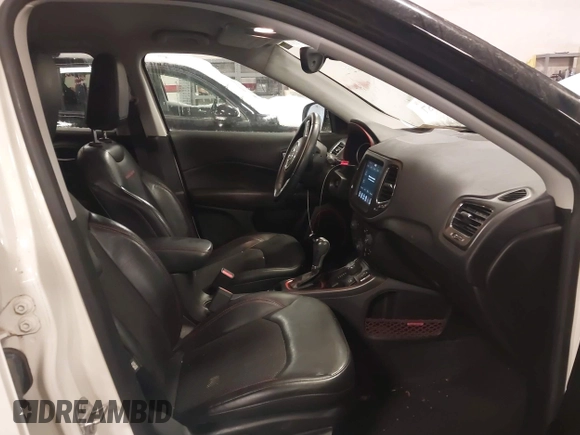 2018 Jeep Compass Trailhawk with VIN 3C4NJDDB2JT328269, listed as a IAAI auction lot 41597957 with 66,789 mi miles and . Bid and sale history available at carsss.com. Image 5.
