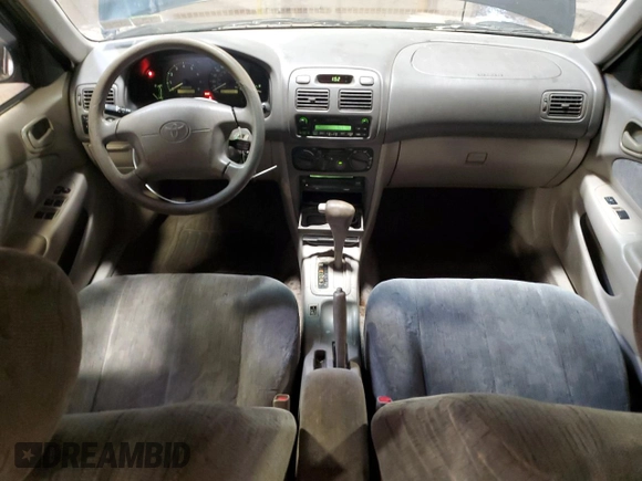 1999 Toyota Corolla VE with VIN 2T1BR12E2XC136739, listed as a Copart auction lot 60693625 with 170,989 mi miles and Salvage title. Bid and sale history available at DreamBid. Image 8.