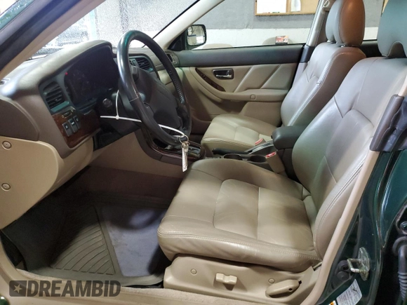 2002 Subaru Legacy Outback Limited with VIN 4S3BH686527655570, listed as a Copart auction lot 84155434 with 210,207 mi miles and Salvage title. Bid and sale history available at DreamBid. Image 7.