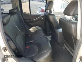 2010 Nissan Xterra S with VIN 5N1AN0NU2AC519838, listed as a Copart auction lot 57301355 with 129,990 mi miles and Salvage title. Bid and sale history available at DreamBid. Image 11.