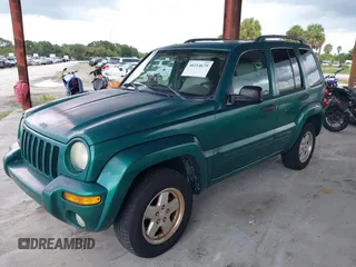 2004 Jeep Liberty Limited with VIN 1J4GK58K94W104382, listed as a IAAI auction lot 40214679 with 143,836 mi miles. Bid and sale history available at carsss.com. Image 4.
