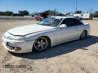 1997 Lexus SC 300 z VIN JT8CD32Z2V0039287, wystawiony jako Copart lot #47066395 z przebiegiem 187 671 mil mil oraz Szkody całkowita. Historia ofert i sprzedaży dostępna na DreamBid. Obrazek 1.