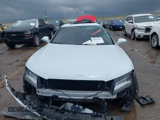 2014 Audi A7 Prestige z VIN WAU2GAFC7EN126780, wystawiony jako IAAI lot #42095865 z przebiegiem Nie podano mil oraz . Historia ofert i sprzedaży dostępna na DreamBid. Obrazek 12.