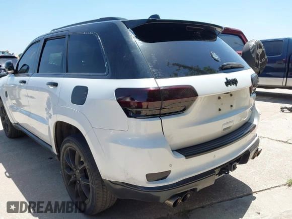 2015 Jeep Grand Cherokee Summit с VIN 1C4RJFJTXFC173287, выставлен на аукционе IAAI как лот 42794100 с пробегом 125 705 миль миль и . История ставок и продаж доступна на DreamBid. Изображение 3.