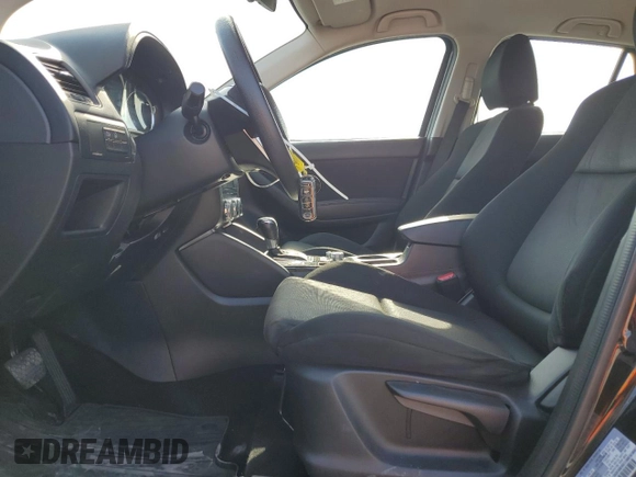 2016 Mazda CX-5 Sport with VIN JM3KE4BY6G0749973, listed as a Copart auction lot 54131635 with 97,480 mi miles and Salvage title. Bid and sale history available at DreamBid. Image 7.