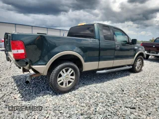 2004 Ford F-150 XL with VIN 1FTPX12564NA87792, listed as a Copart auction lot 60489655 with 396,269 mi miles and Salvage title. Bid and sale history available at DreamBid. Image 3.