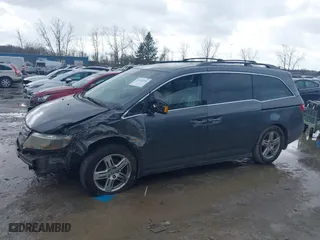 2011 Honda Odyssey Touring with VIN 5FNRL5H95BB007514, listed as a IAAI auction lot 41402516 with 281,032 mi miles. Bid and sale history available at carsss.com. Image 15.