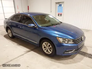 2017 Volkswagen Passat 1.8T S with VIN 1VWAT7A38HC013602, listed as a IAAI auction lot 41218616 with 77,497 mi miles. Bid and sale history available at carsss.com. Image 1.