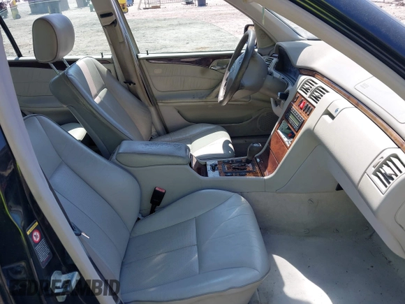 2000 Mercedes-Benz E 320 with VIN WDBJF65J2YB105399, listed as a IAAI auction lot 42076107 with 277,701 mi miles and . Bid and sale history available at DreamBid. Image 5.