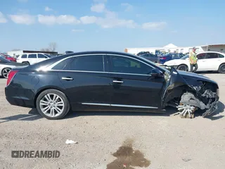 2018 Cadillac XTS Luxury with VIN 2G61M5S36J9120571, listed as a IAAI auction lot 41486816 with 77,302 mi miles. Bid and sale history available at carsss.com. Image 14.
