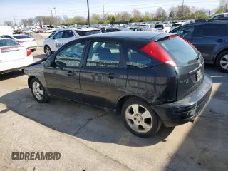 2007 Ford Focus S z VIN 1FAHP37N07W161088, wystawiony jako Copart lot #54140415 z przebiegiem 241 367 mil mil oraz Szkody całkowita. Historia ofert i sprzedaży dostępna na DreamBid. Obrazek 2.