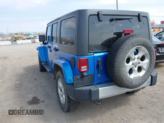 2015 Jeep Wrangler Unlimited Altitude с VIN 1C4HJWEG3FL584314, выставлен на аукционе IAAI как лот 41802581 с пробегом 145 143 миль миль и . История ставок и продаж доступна на DreamBid. Изображение 3.