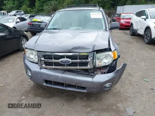 2008 Ford Escape XLT with VIN 1FMCU93108KE75766, listed as a IAAI auction lot 42595254 with 165,436 mi miles and . Bid and sale history available at DreamBid. Image 6.