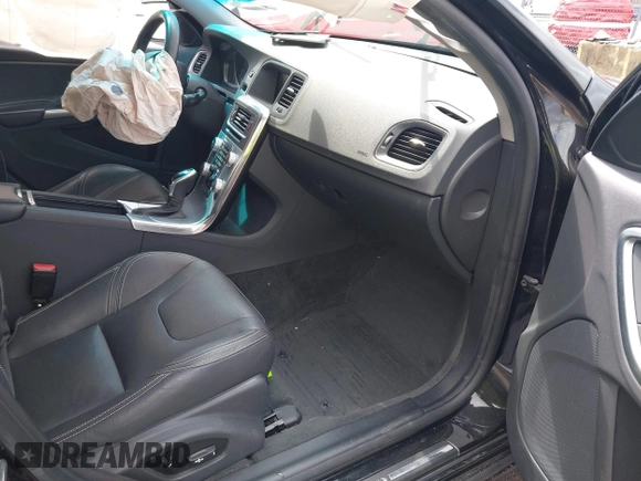 2018 Volvo S60 Dynamic with VIN YV140MTLXJ2459745, listed as a IAAI auction lot 41988052 with 133,268 mi miles. Bid and sale history available at carsss.com. Image 5.