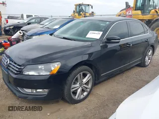 2014 Volkswagen Passat TDI SEL Premium with VIN 1VWCN7A33EC068280, listed as a IAAI auction lot 42086420 with 153,656 mi miles. Bid and sale history available at carsss.com. Image 2.