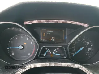 2016 Ford Focus SE z VIN 1FADP3F2XGL341167, wystawiony jako Copart lot #59042435 z przebiegiem 71 345 mil mil oraz Szkoda całkowita • Salvage title. Historia ofert i sprzedaży dostępna na DreamBid. Obrazek 9.
